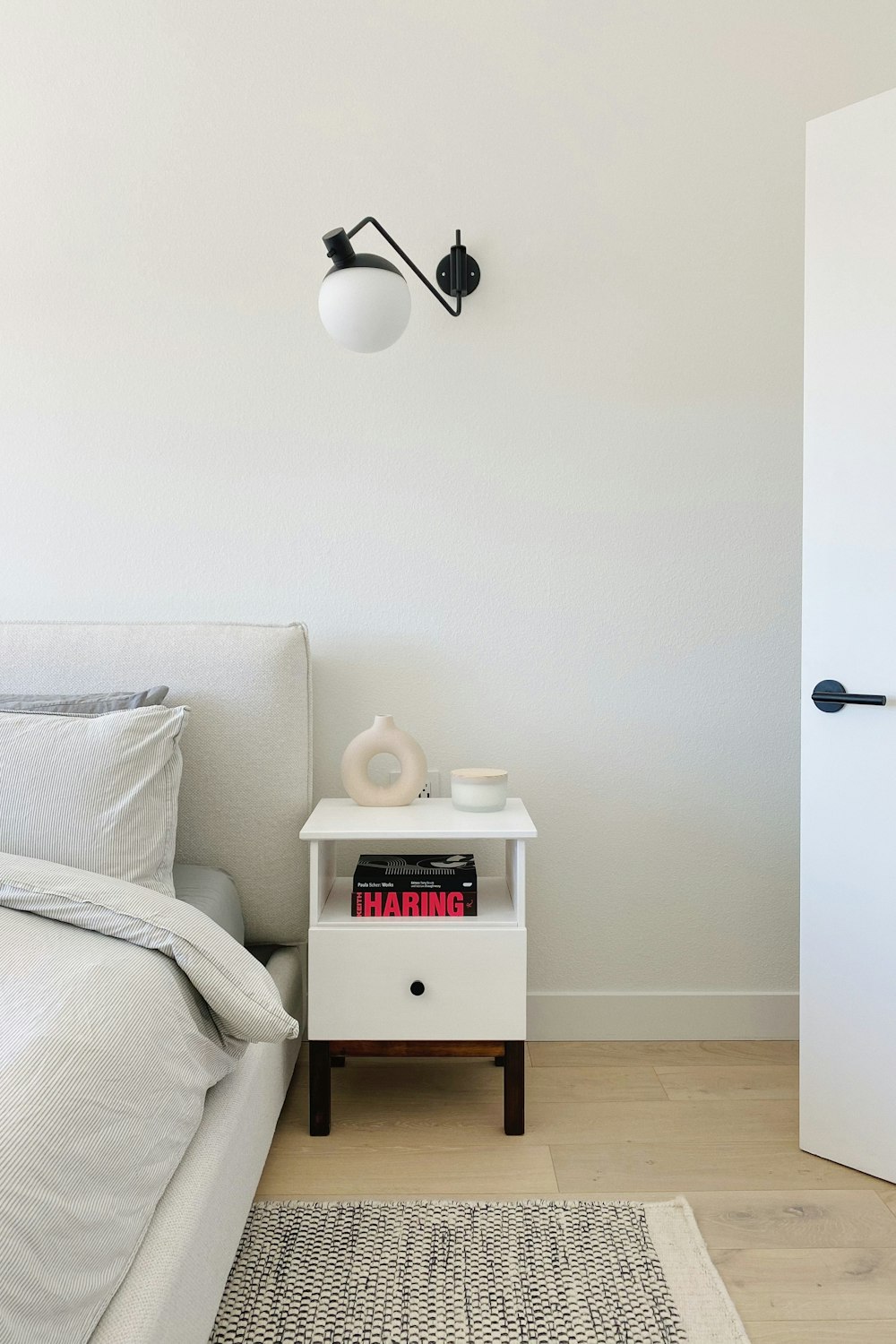 Ottoman Storage Bed vs Divan | Small Bedroom Storage Ideas — pin this guide from The Scandi Flat: Ottoman and divan storage beds compared for small UK bedrooms — gas-lift versus drawers, the clearance you need to lift one, and what actually fits underneath.